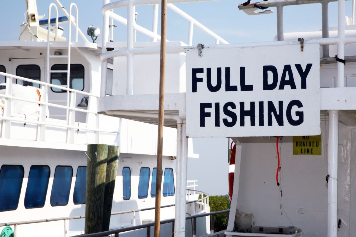 full day fishing sign on a fishing charter boat